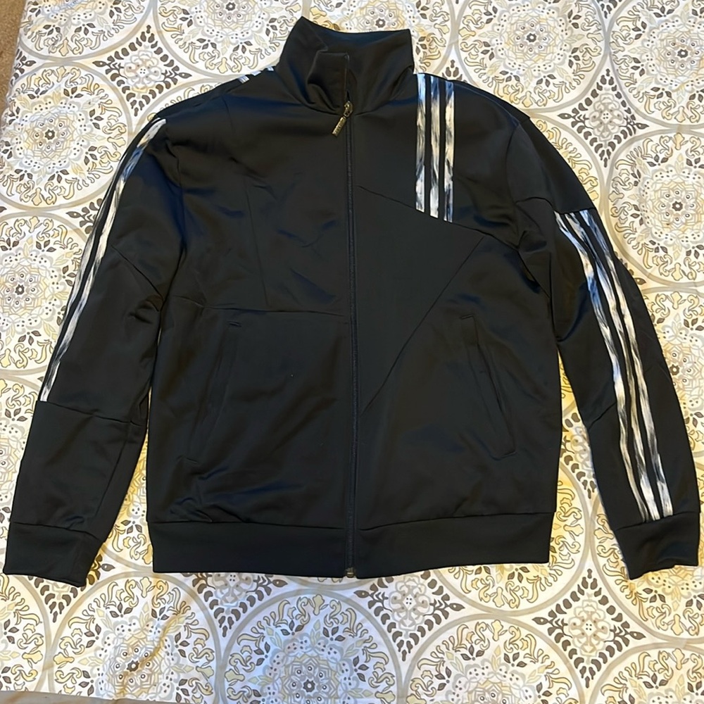 Black Adidas Danielle Cathari tracksuit.